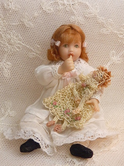Miniature baby doll